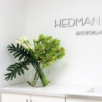 Lunar Vase with Green Cymbidiums and Callas – The Ever Botanic