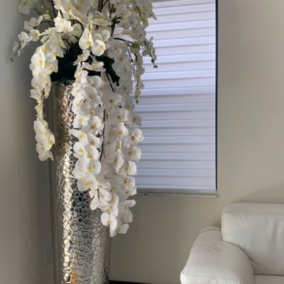 Cascading Phalaenopsis Orchids in Extra Tall Hammered Vase – The Ever Botanic